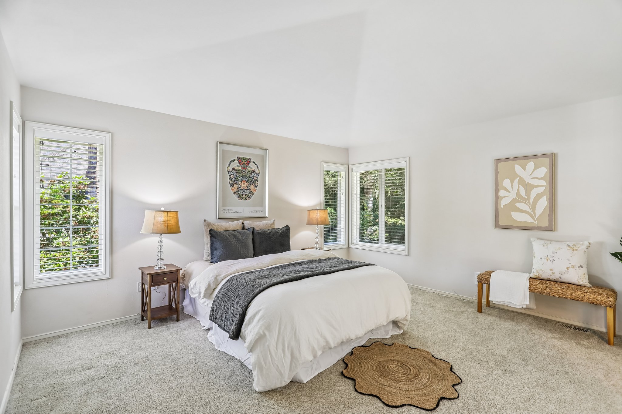 Large Primary bedroom with ensuite bath and walk in closet.