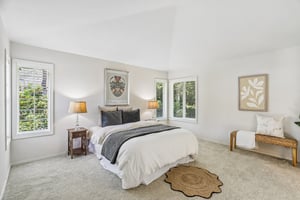 Large Primary bedroom with ensuite bath and walk in closet.