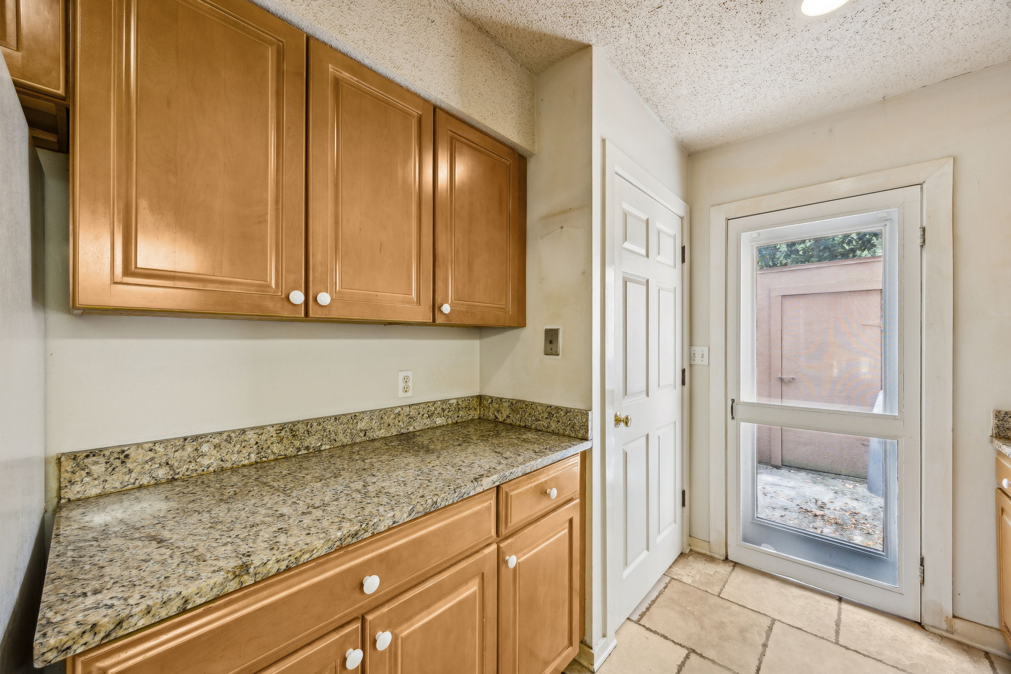 Kitchen with Access to Crib Area. Great for Grilling.