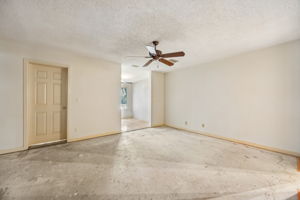 Primary Bedroom Overlooks Golf Course.