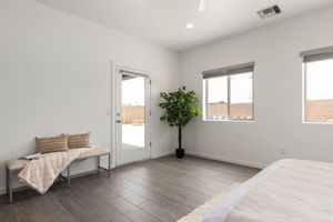 Primary Bedroom/ Door to back patio