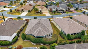 Aerial Rear Elevation with Rear Paver Patio and Mature Privacy Landscaping