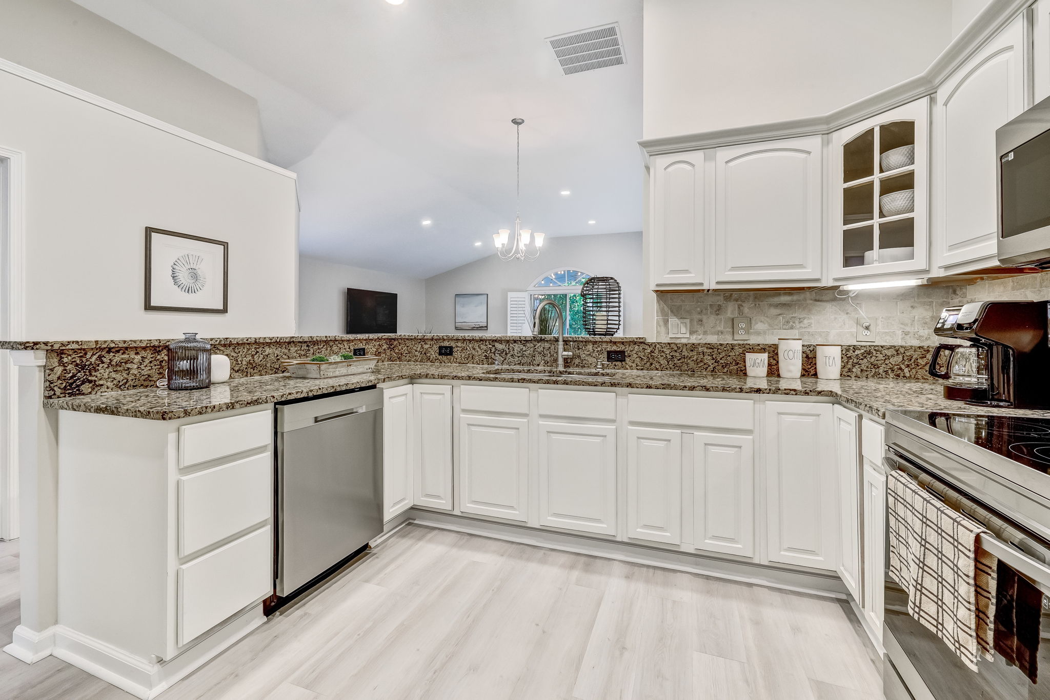 Kitchen opens to Family Room