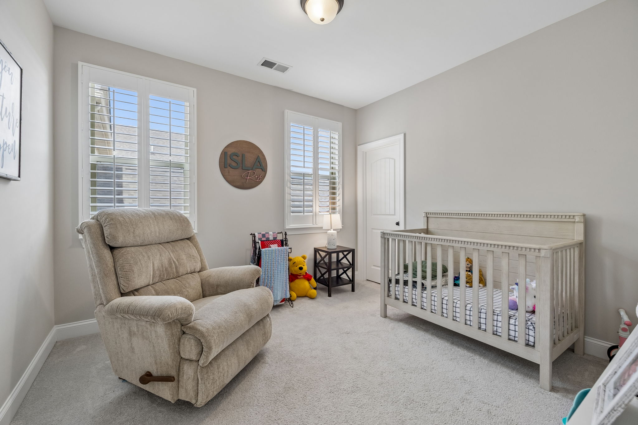 Bedroom 2 with Walk-in-Closet and shutters.