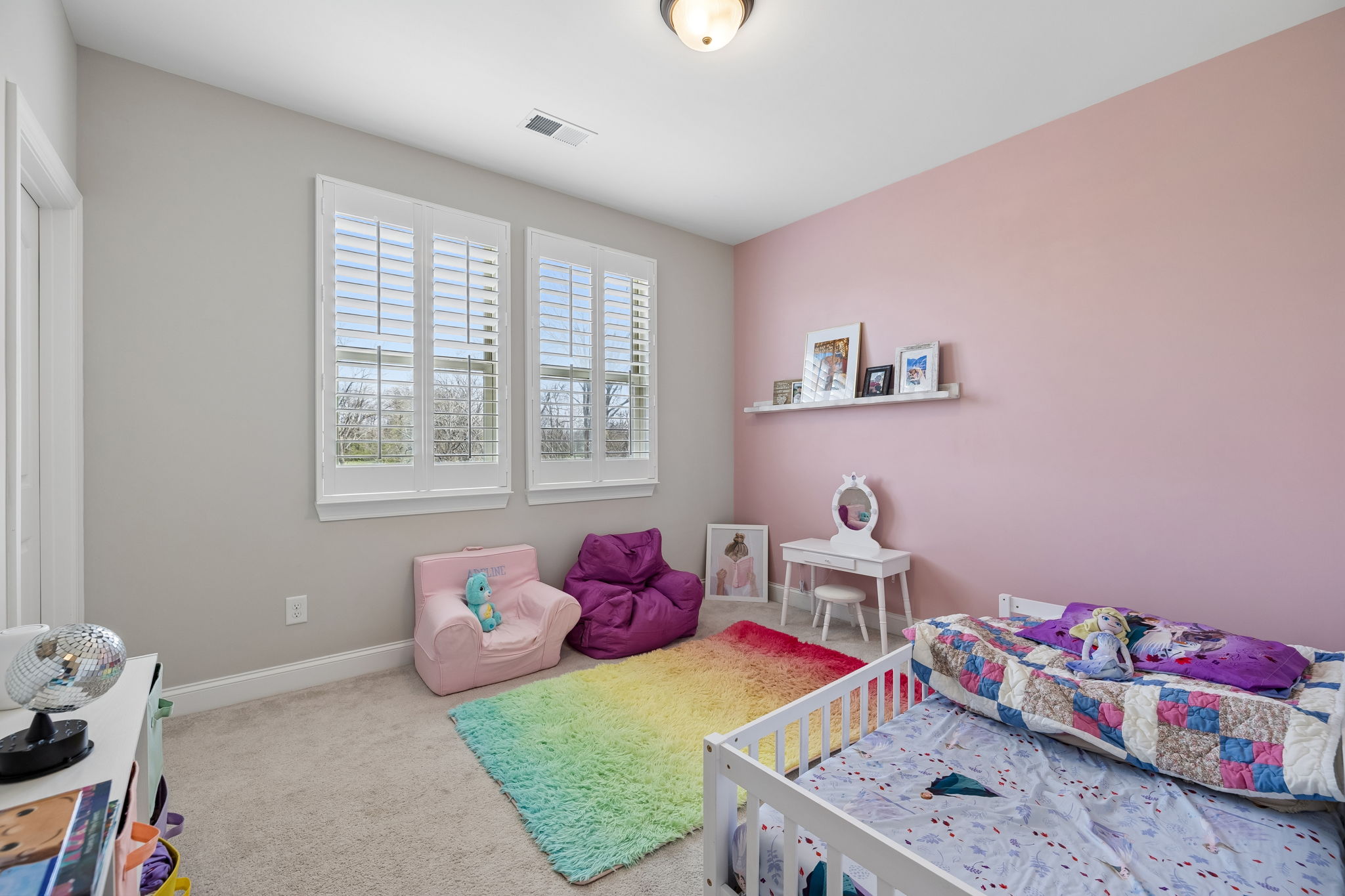 Bedroom 3 - with Walk-in-Closet and shutters.