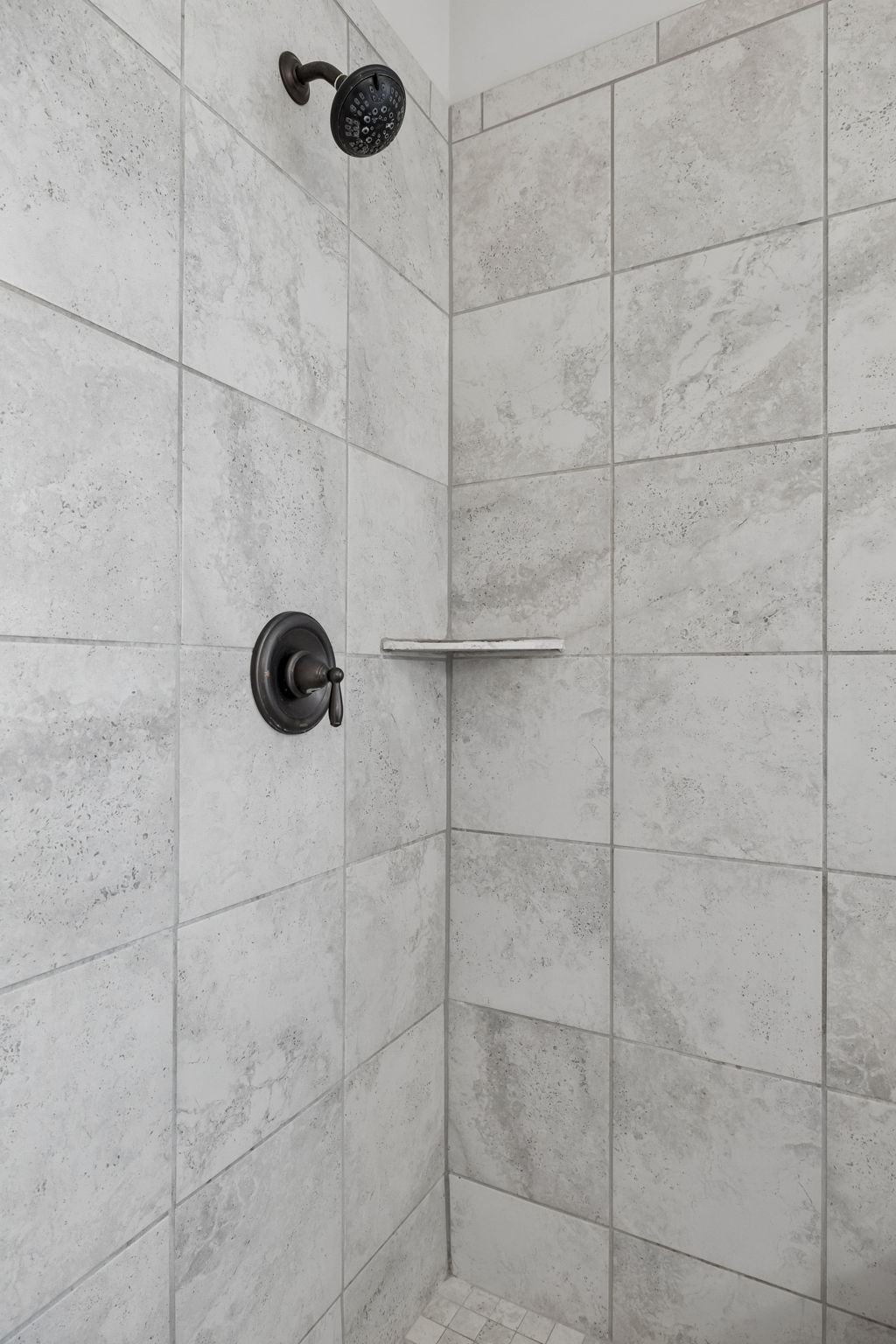 Tile from shower in primary suite.