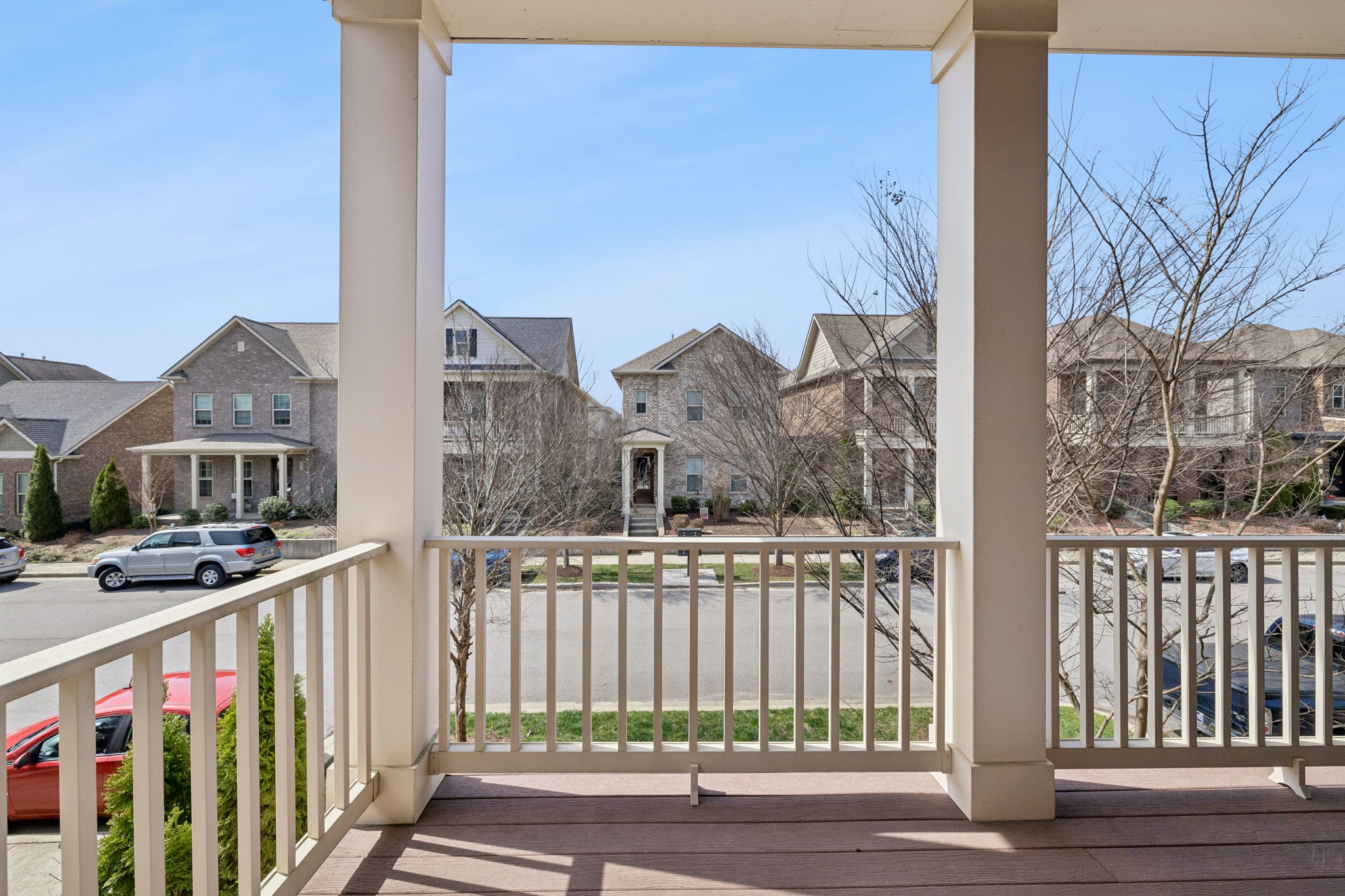 Alternate view from second story balcony, just off the Primary Bedroom suite.  Ready for morning coffee or unwinding in the afternoon with a tall glass of . . . sweet tea!