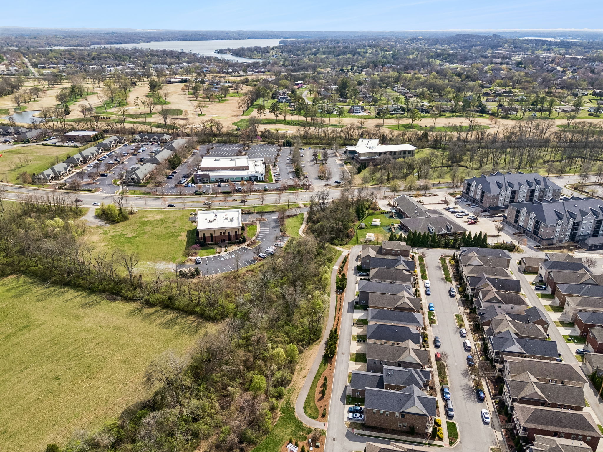 334 Cornelius Way in the front with Hendersonville Public Library shown just above.  The library is adjacent to Drake Creek Park with  beautiful tree-canopied walking trails.