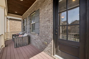 The second story balcony on the front of the home is accessed solely from the Primary Bedroom.  Perfect for coffee and a book - at any time of day!!!