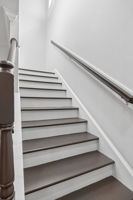 Attractive wooden stair treads with iron-look ballusters.  RECENTLY SANDED AND FINISHED.  UPDATED PICTURES FORTHCOMING.  They are ready for you!