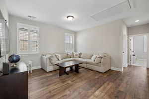 NEW LVP FLOORING RECENTLY INSTALLED IN THIS AREA. Host a Super Bowl party or set up a Play room in this Flexible Bonus area upstairs.  Note: The owners invested $6000 to in shutters to select windows for privacy/glare reduction.