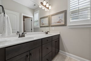 Second full bath with double sink/vanity.  Shower/tub combo in private separate area.  Allows privacy and convenience.