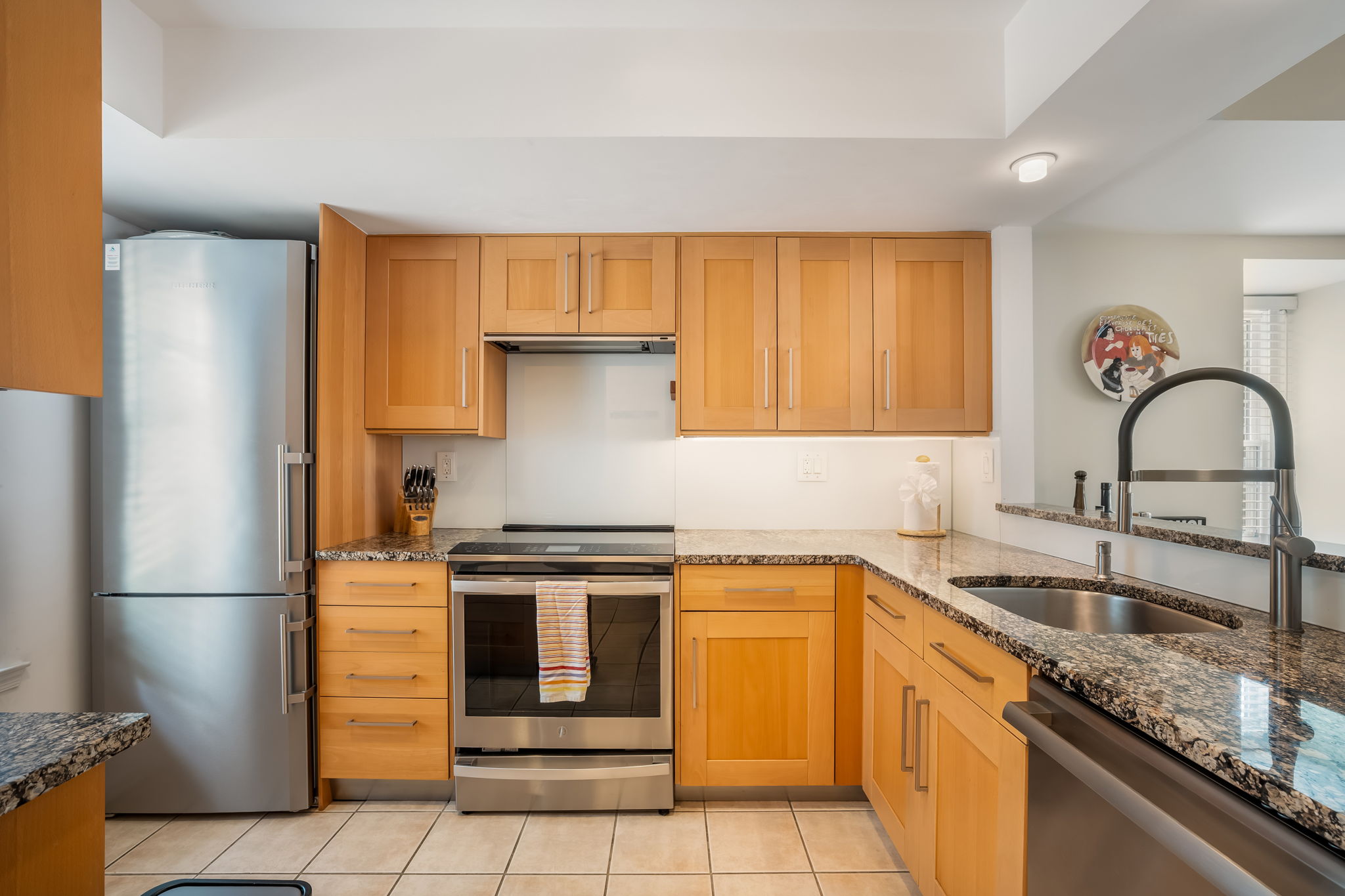 Updated Kitchen w/granite, stainless & lake views!