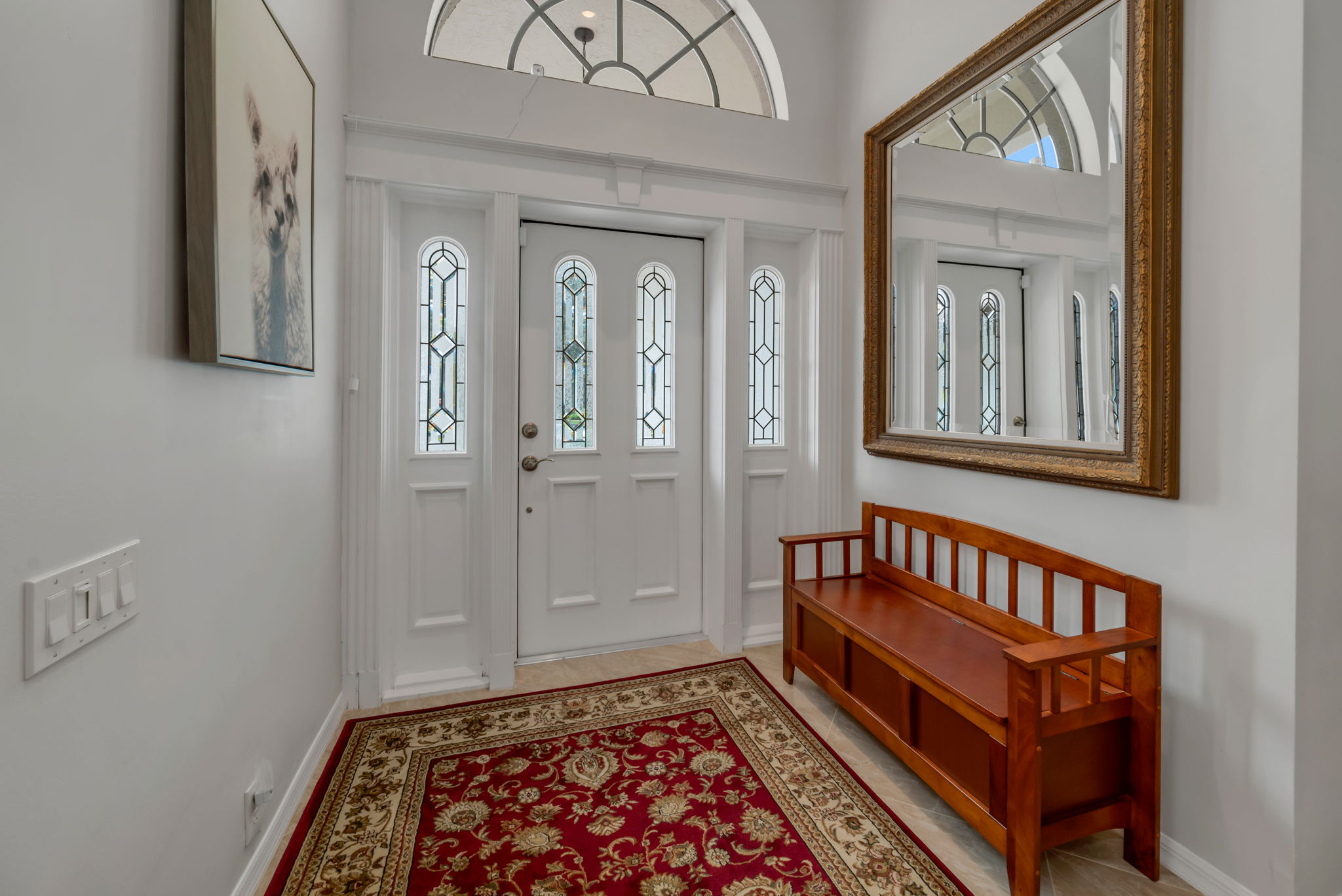 As you walk in to front door you are greeted with updated pool area