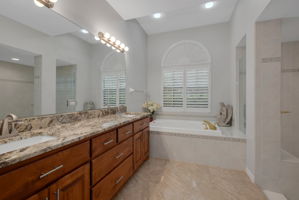 Primary Bathroom updated and has large window for plenty of natural light