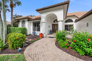 Pavered walk way to covered EntryWay