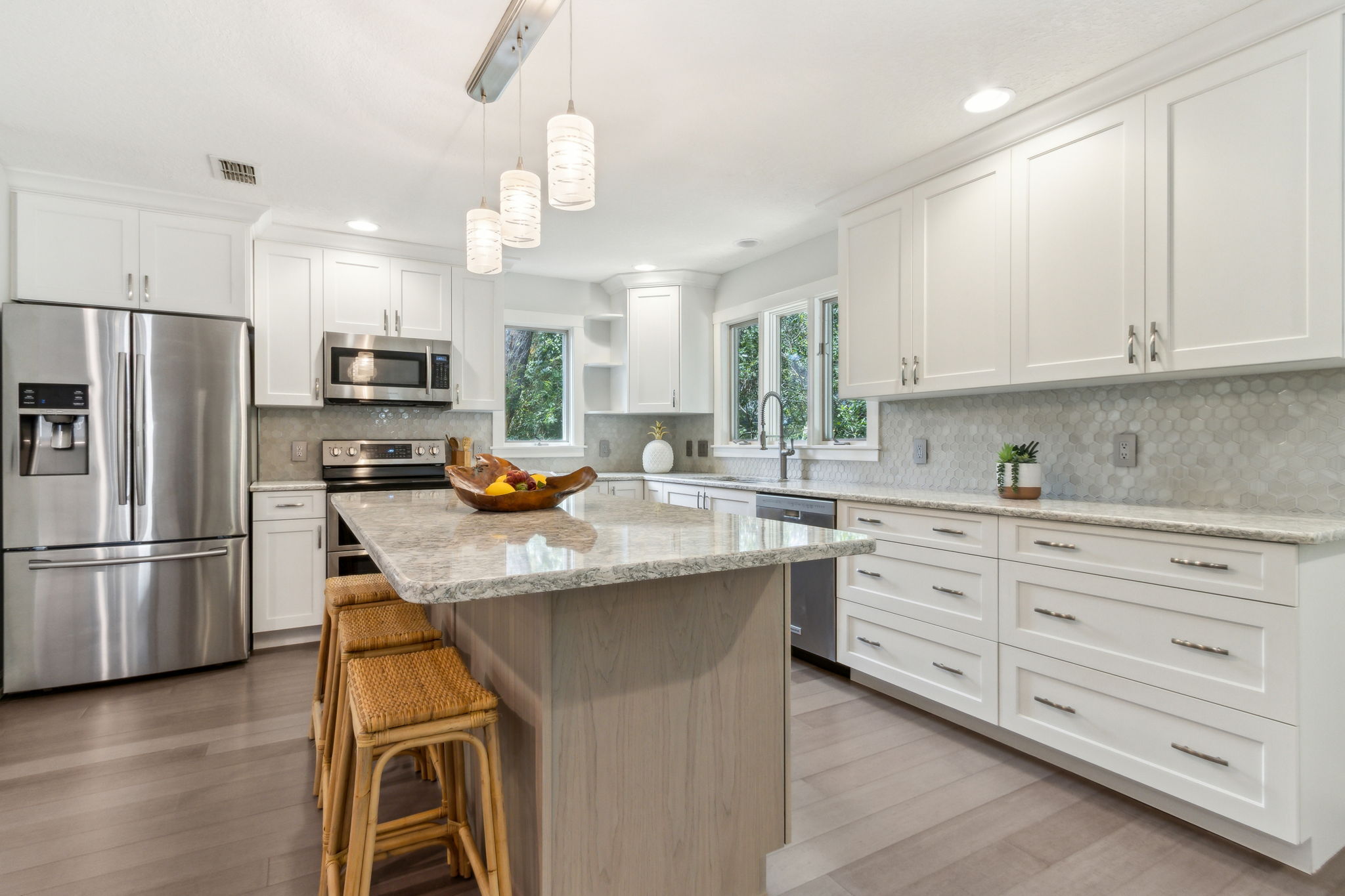 The kitchen was upgraded with new quartz counters ...