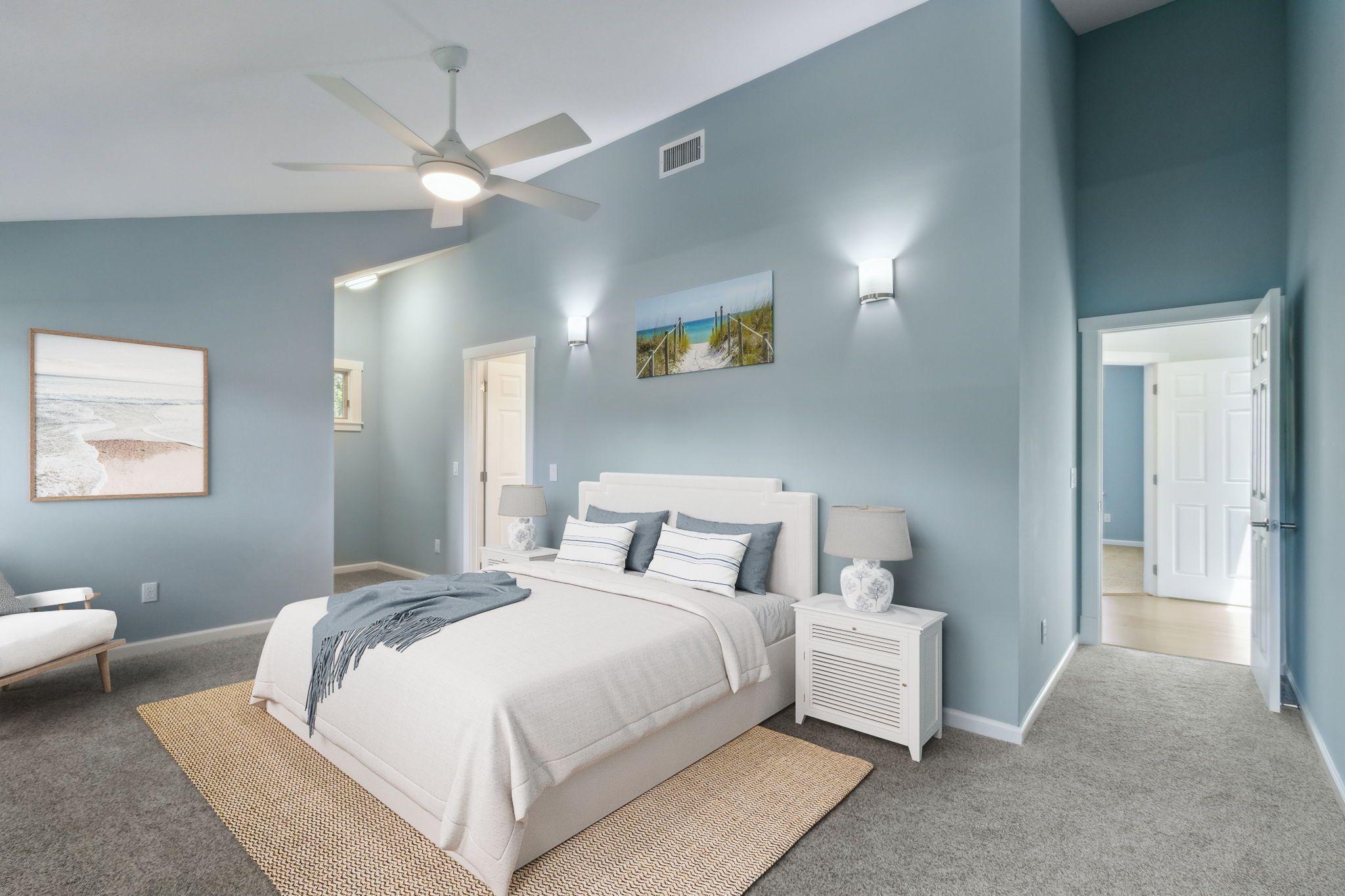 The spacious master bedroom accommodates king furniture easily ...