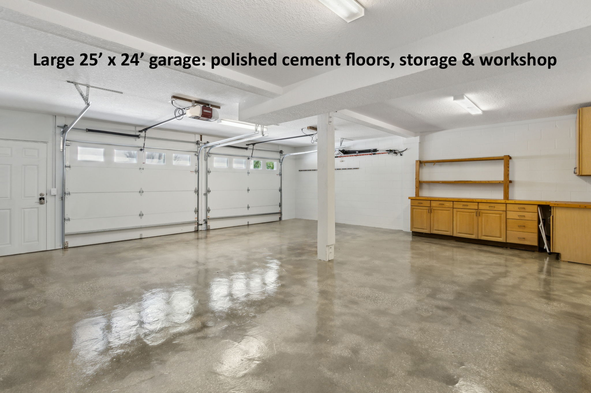 The 2-car garage is massive and immaculate ...
