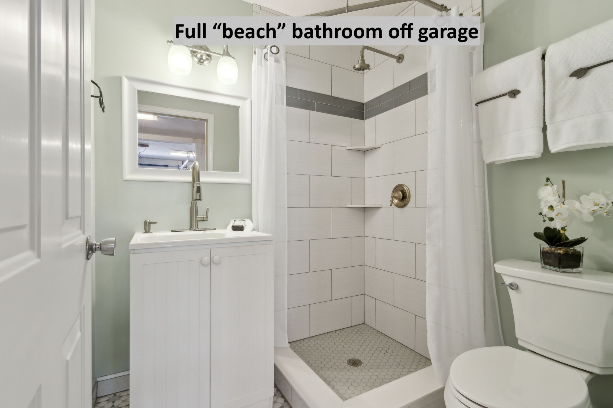 ... and has a full renovated bathroom, a welcome amenity after a day at the beach.
