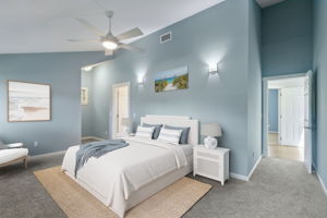 The spacious master bedroom accommodates king furniture easily ...