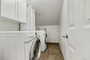 A large laundry room is located on the 3rd floor as well, providing convenient access to the bedrooms.