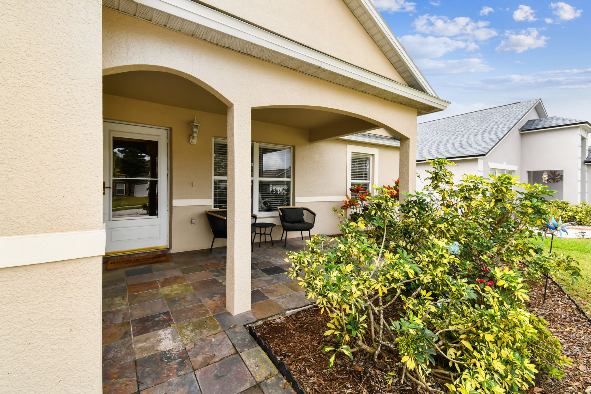 Tiled & Covered Entry Porch