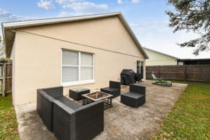 Huge patio spans the back of the home