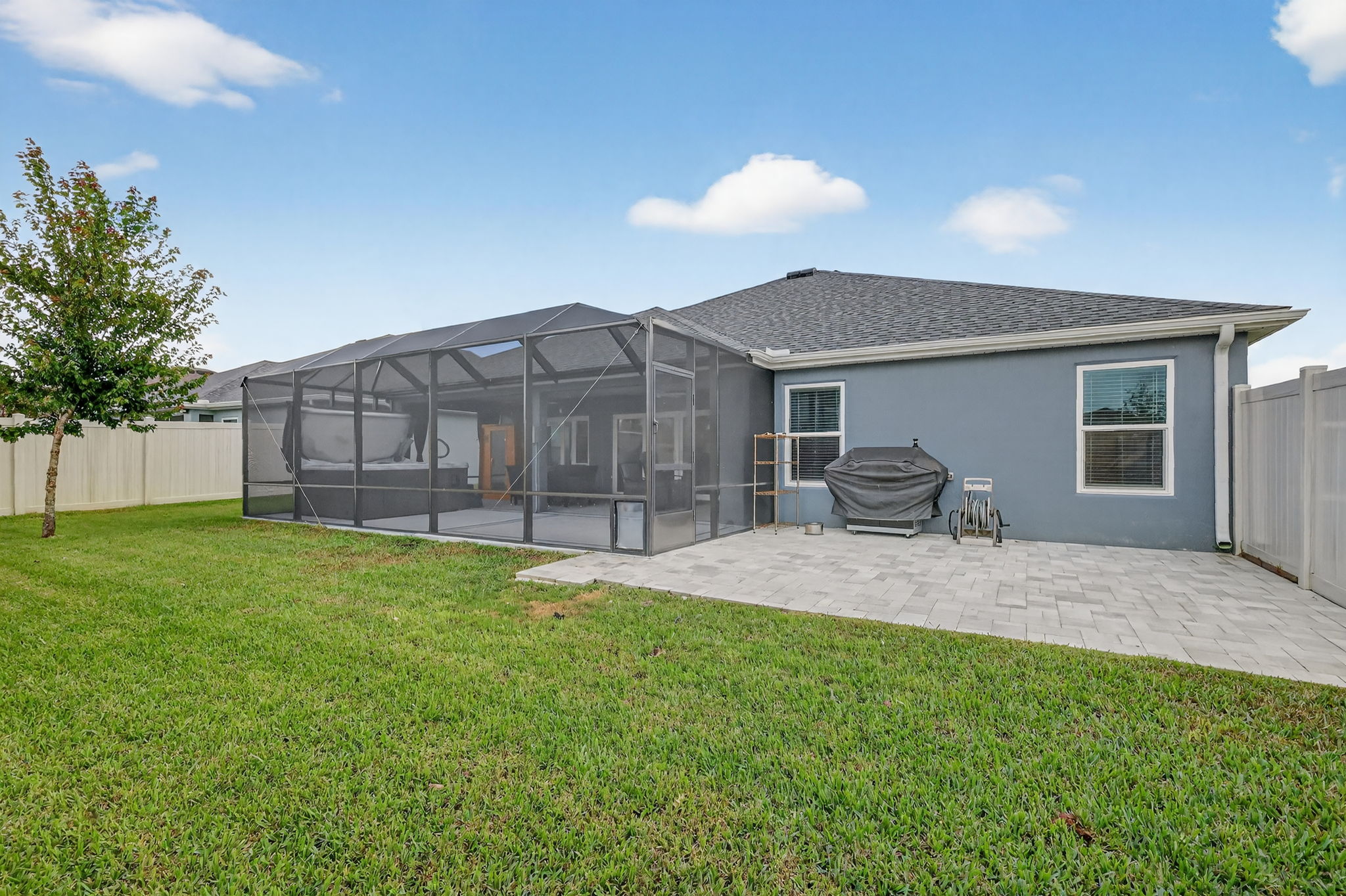 Rear Elevation with Patio and Fenced Yard
