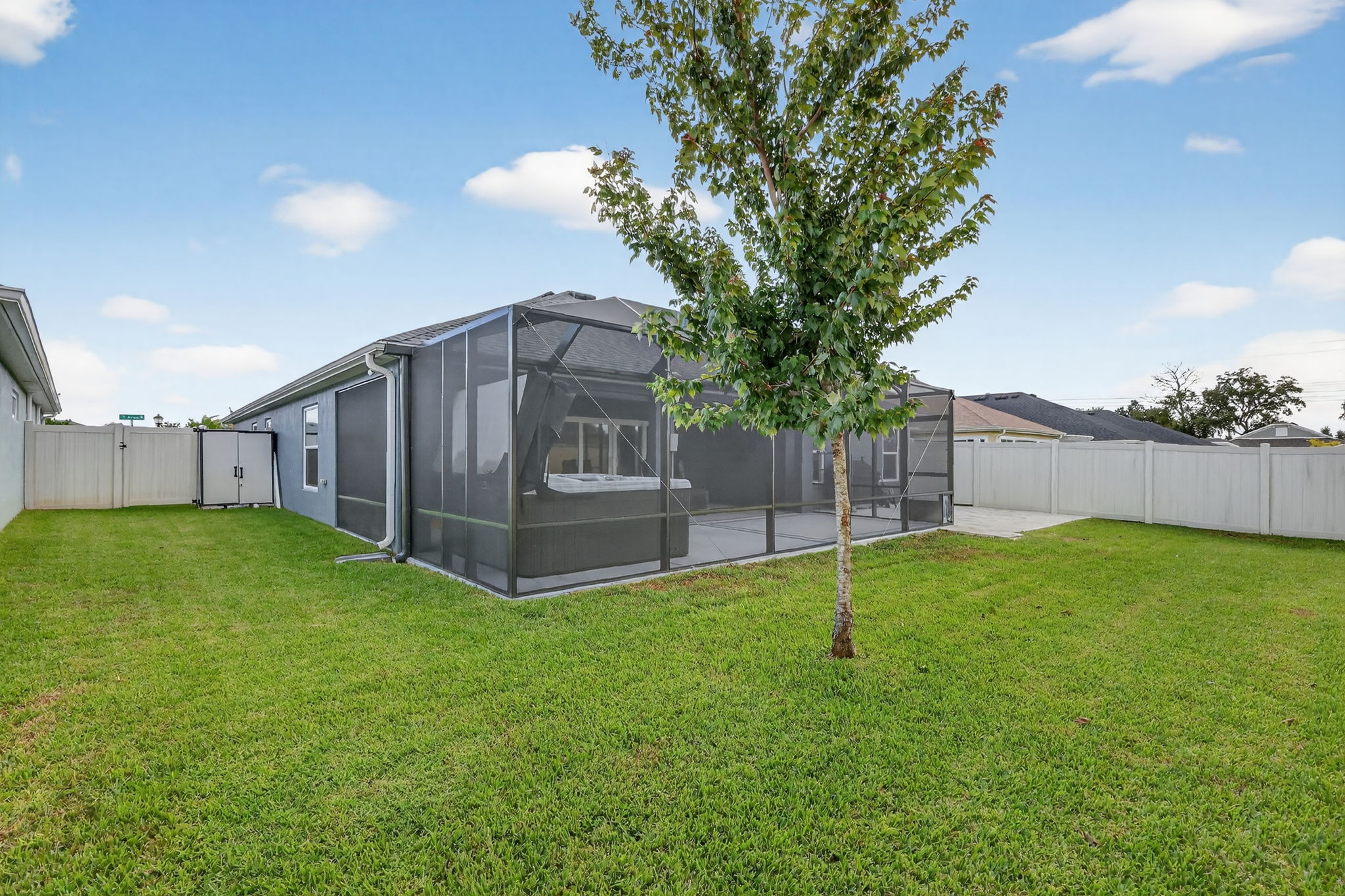 Rear/Side Elevation with Fenced Yard