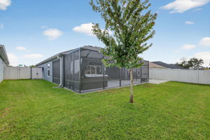Rear/Side Elevation with Fenced Yard