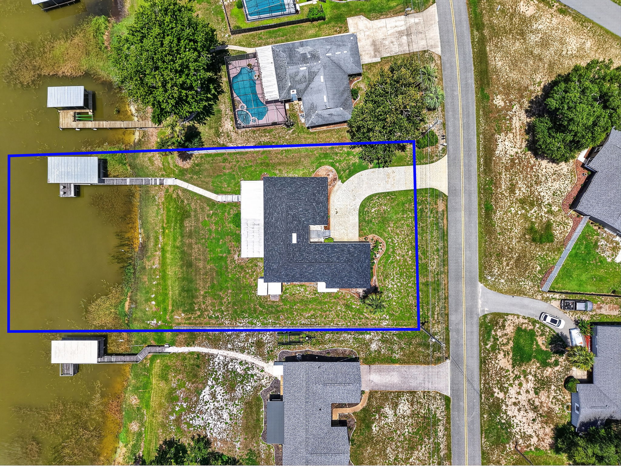 Aerial Side Elevation with Property Lines and FABULOUS WATERFRONT VIEWS of Lake Griffin!