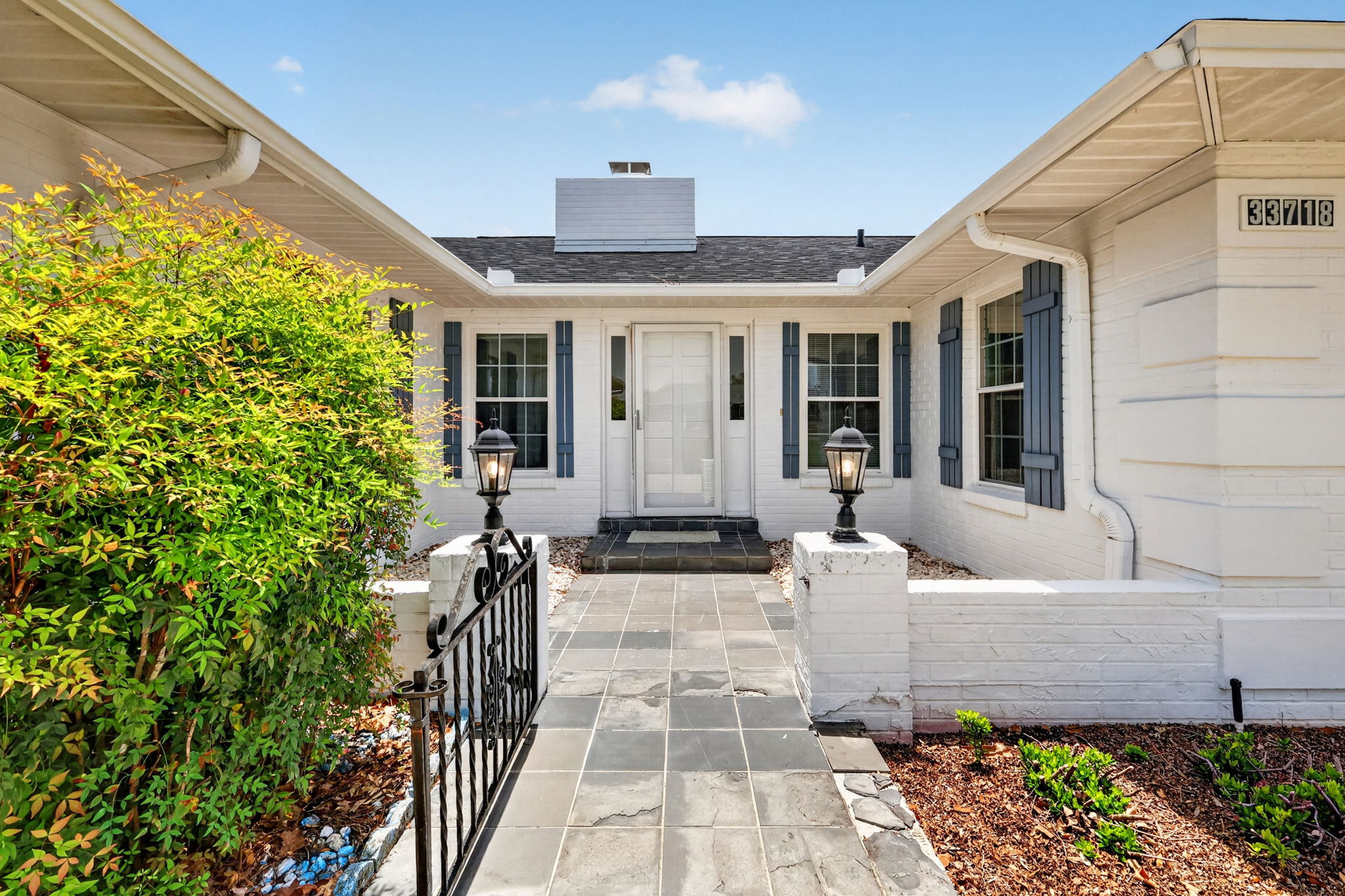 Gated Front Courtyard and Entry