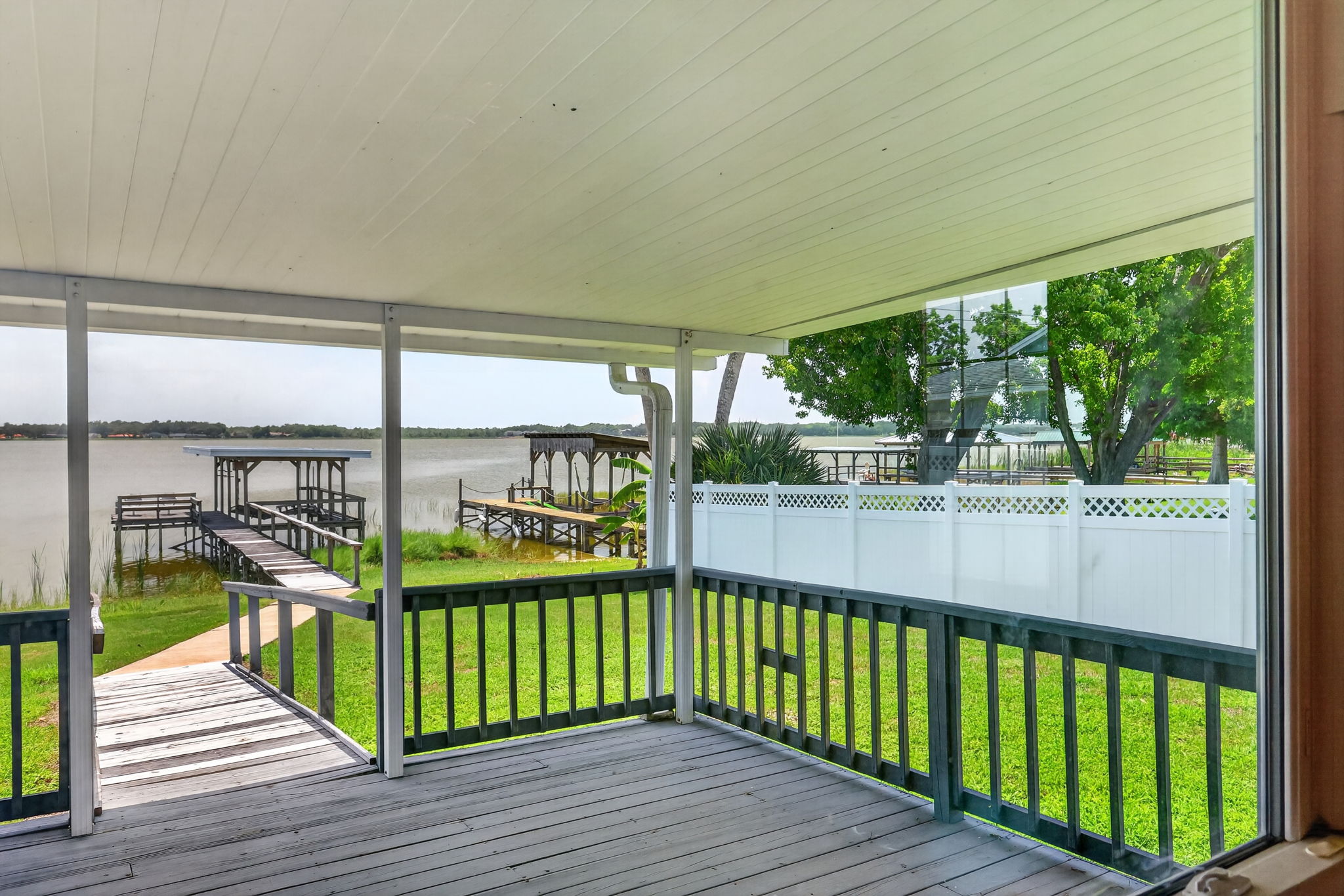 Extended Covered Porch with MAGNIFICENT VIEWS of Lake Griffin!