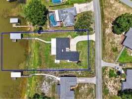 Aerial Side Elevation with Property Lines and FABULOUS WATERFRONT VIEWS of Lake Griffin!