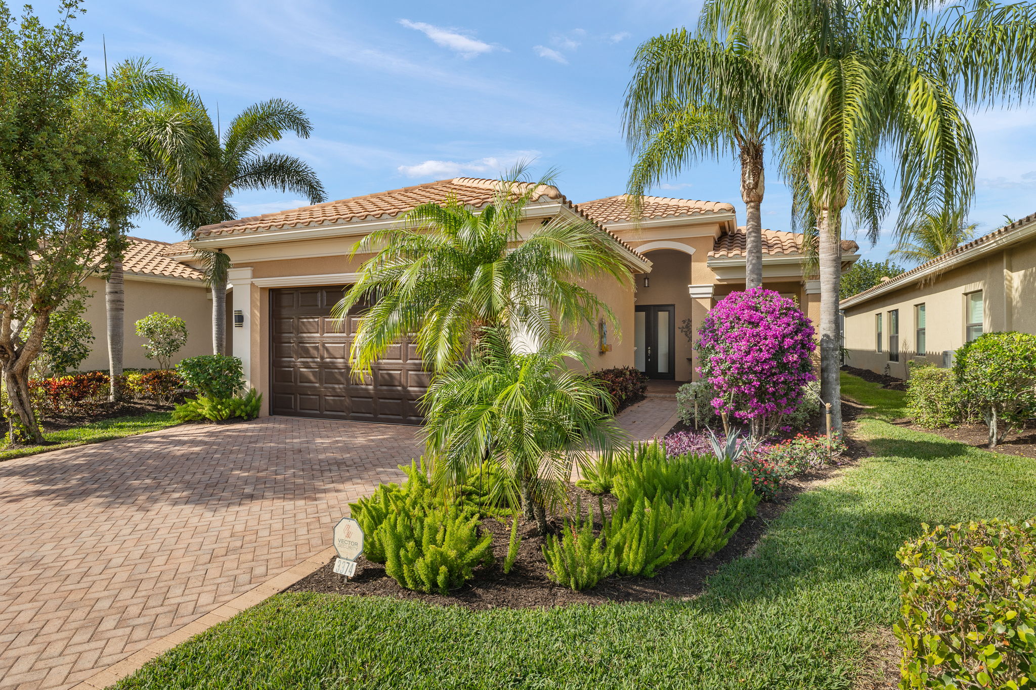 Exterior upgrades of lighting, widened driveway + upgraded landscaping!