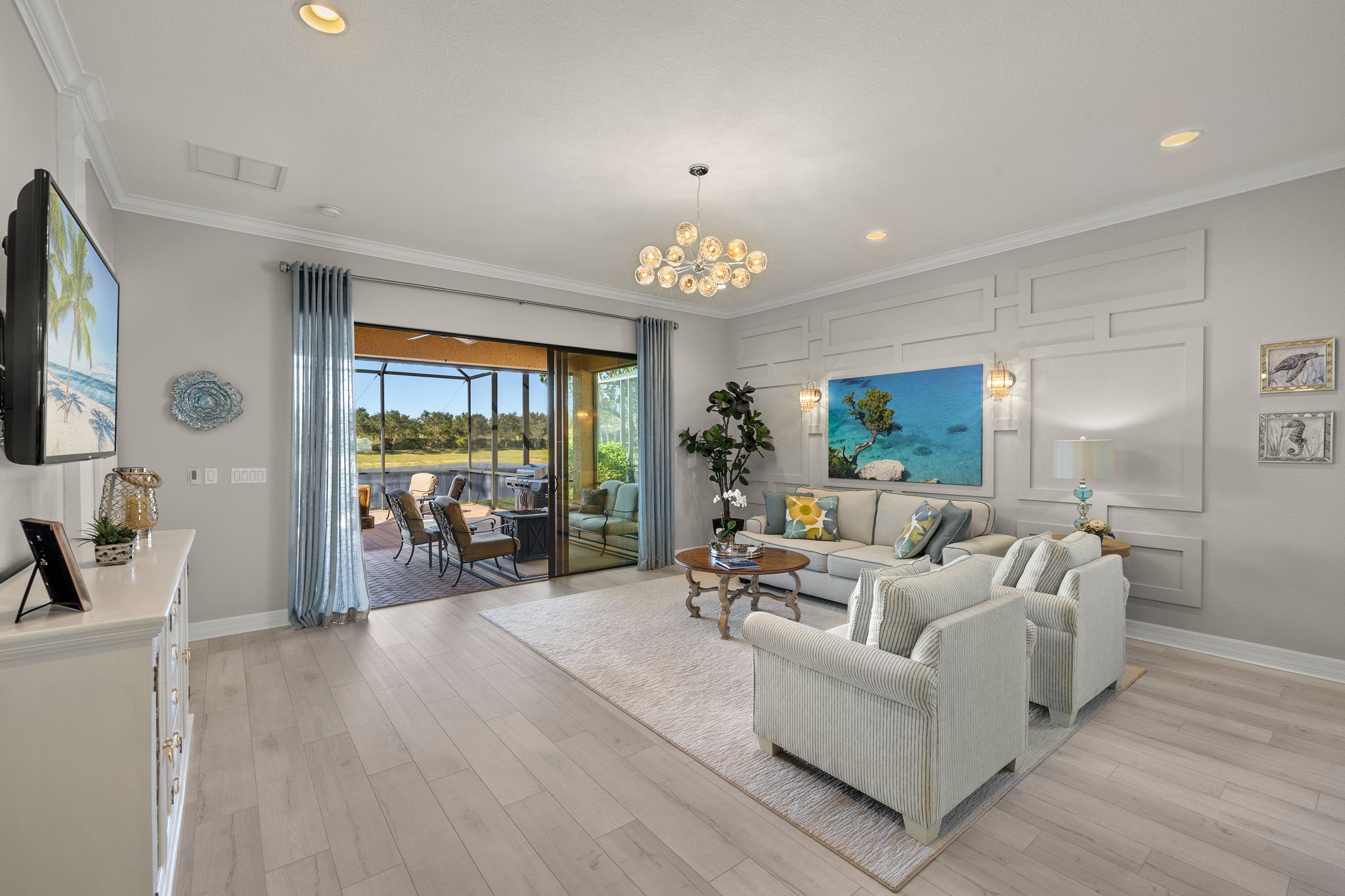 Coastal decor awaits you PLUS the just shy of 1000 sf of extended lanai offers you outdoor living space to entertain, relax, and soak up all SWFL has to offer!