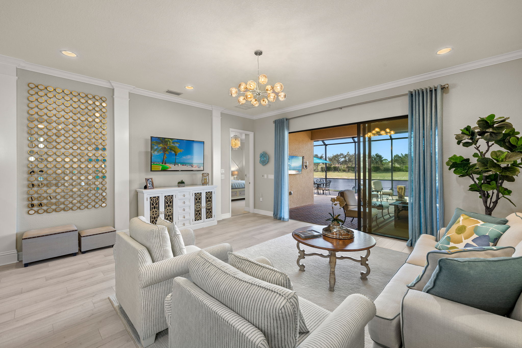 Spacious great room with sleep sofa that makes hosting family or friends a breeze; this home comfortably sleeps 8!!! Mirrored accent piece to convey. Get a load of that private, rear lake view!!!...