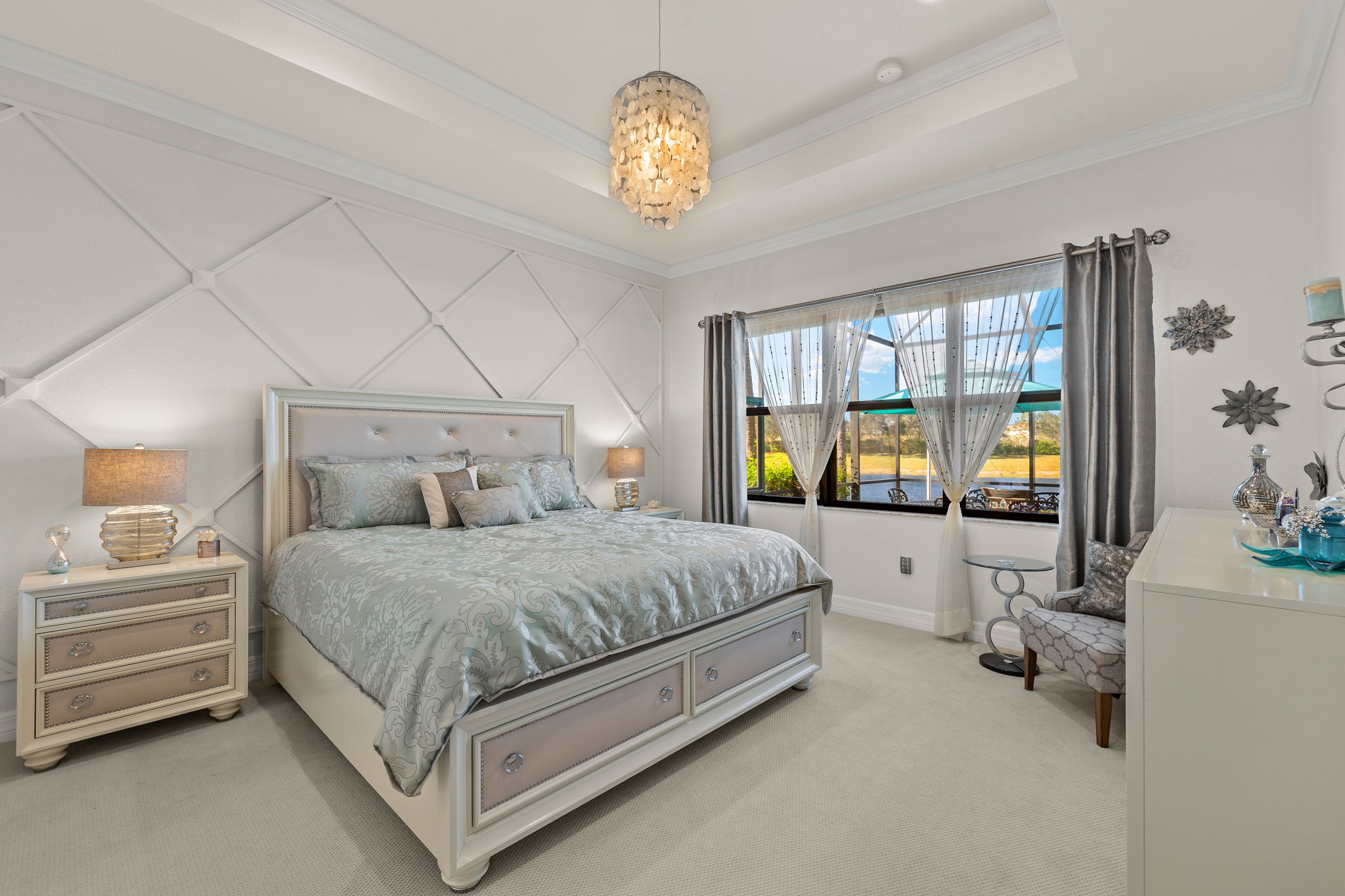 Show stopping decorative wood accent wall PLUS lake view to wake up to!!!