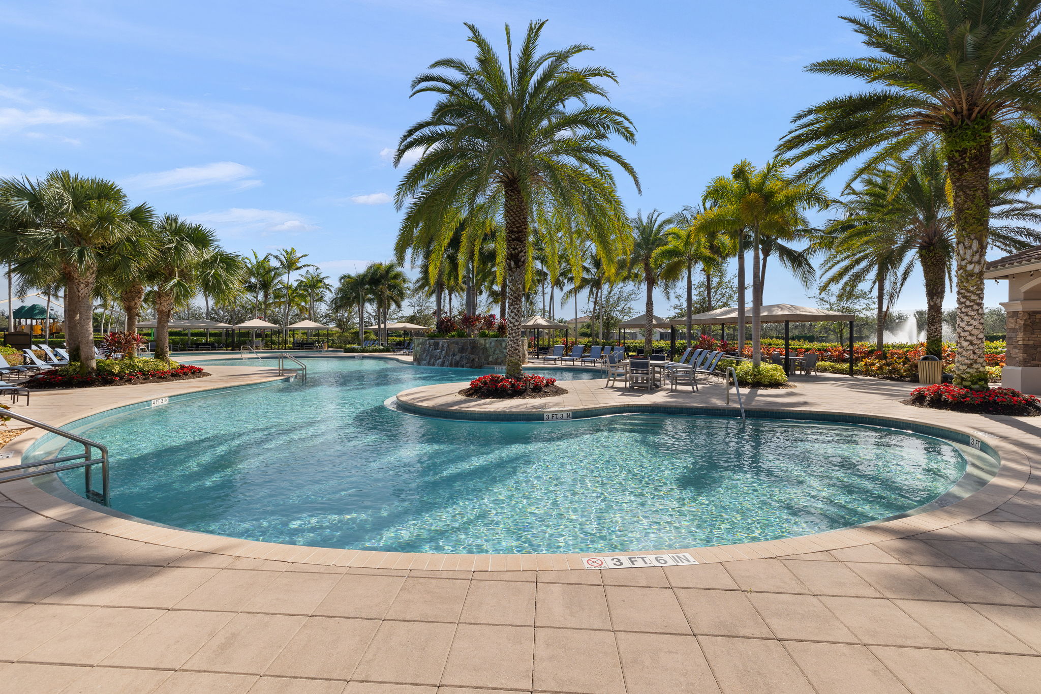 Impressive resort style pool with cabanas and a tiki bar!