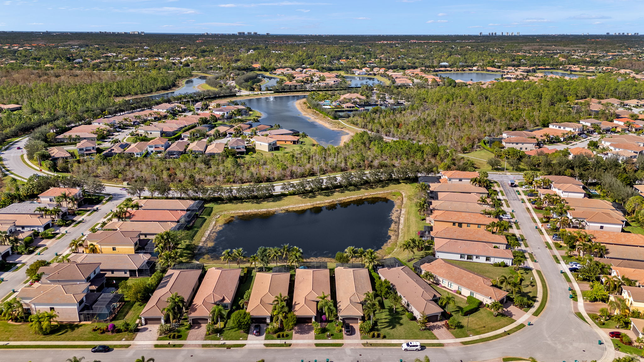 Drone shot is proof positive of NO HOMES directly across the lake from your lanai view!!!