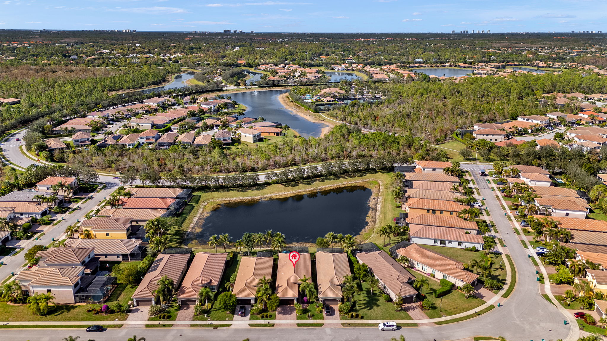 Drone shot is proof positive of NO HOMES directly across the lake from your lanai view!!!