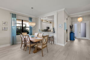 Dining Room table boasts 2 leaves that will open to seat 10 for holidays and or entertaining (conveys!). Custom window treatments to convey. Upgraded lighting present is certain to be appreciated!...