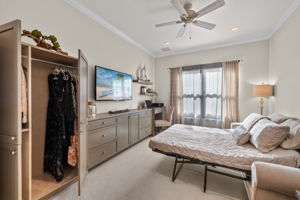 VOILA!!! Ingenious built-in armoire makes this multi-purpose room invaluable and hides away your guests belongings! LOVE< LOVE< LOVE! Pocket doors allows your guests privacy, too!...