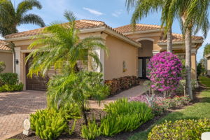 Exterior upgrades of lighting, widened driveway + upgraded landscaping!