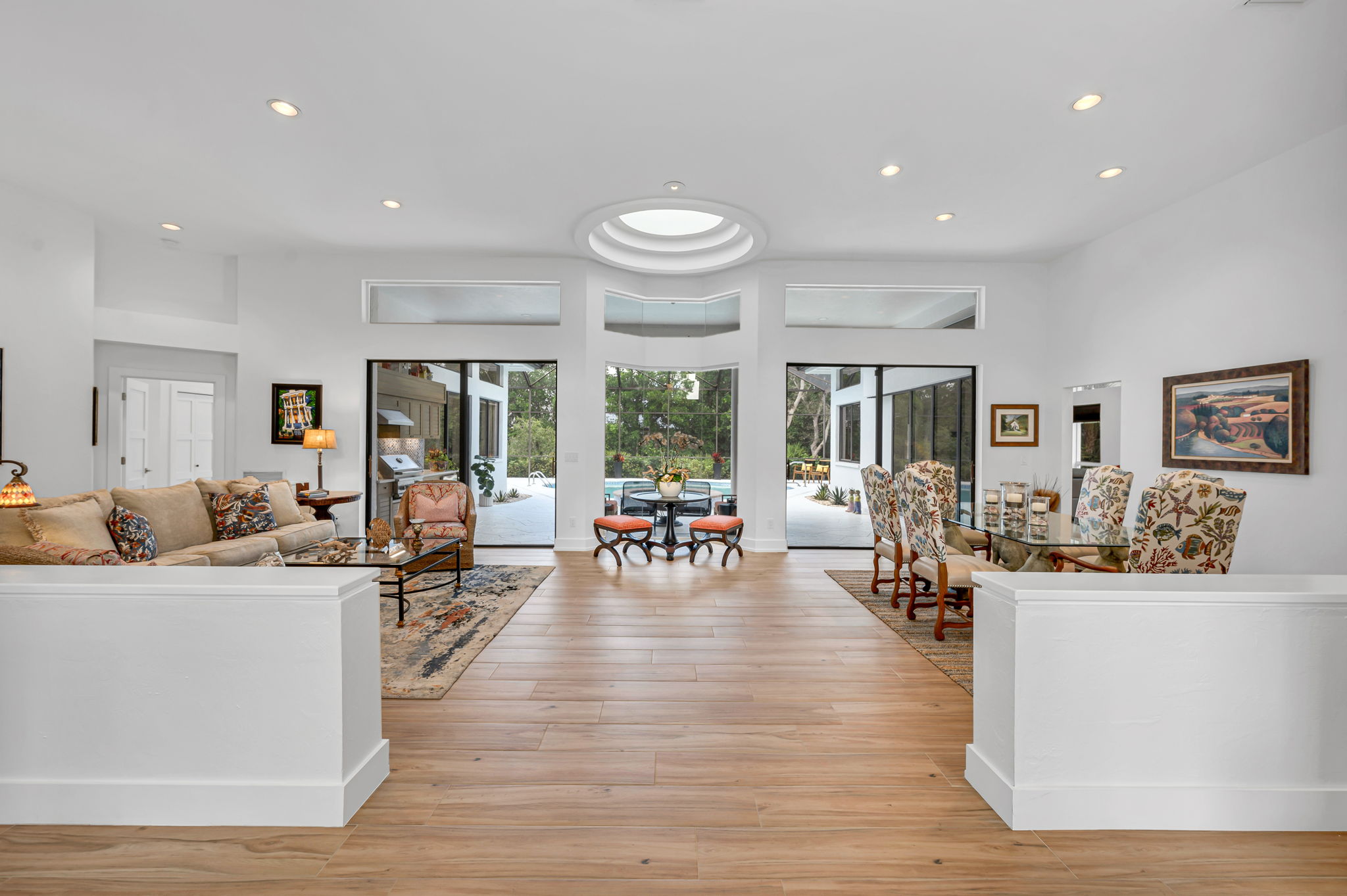 As you enter the Front door, your eyes are captivated by the open concept and architectural rotunda!