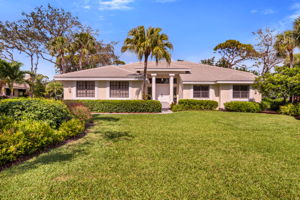 Front Elevation has wonderful Curb appeal.  Home offers long driveway, and side entry garage!