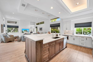 Kitchen has been re-imagined with quartz countertops, cabinetry, and clever storage options