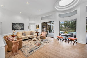 Living Room has easy access to the outdoors and grill/pool area