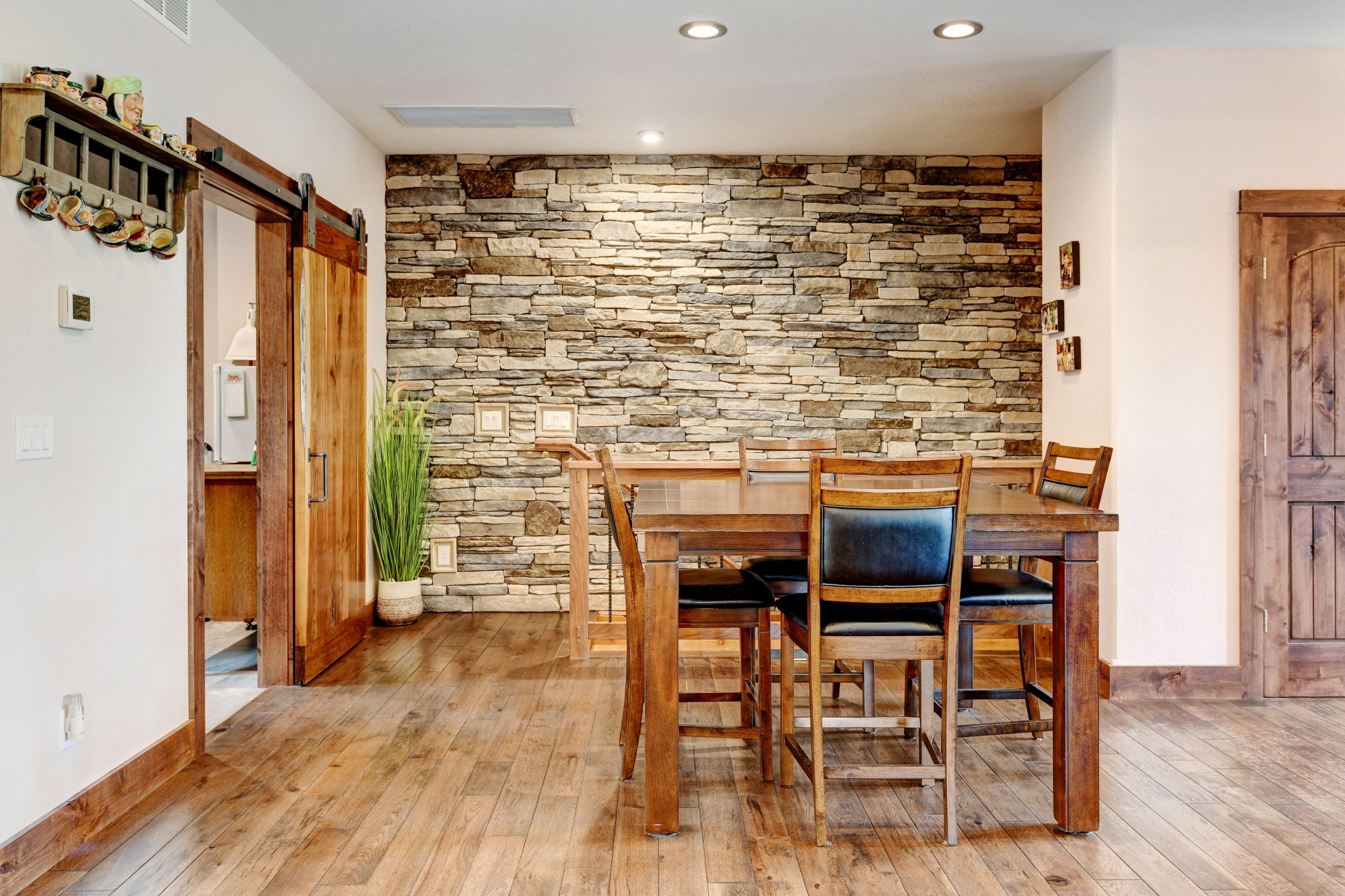 Stacked Stone Accent Wall in Dining Area